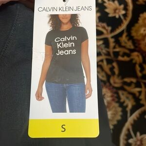 - Woman’s Calvin Klein shirt